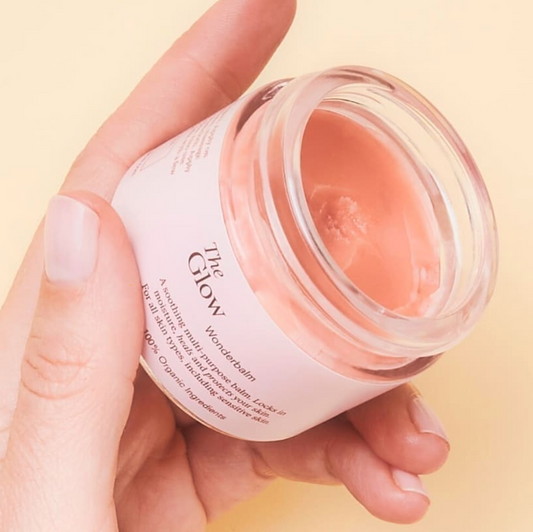 open wonder balm in hand van model