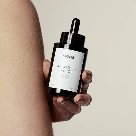 kwarte komijnolie op de huid